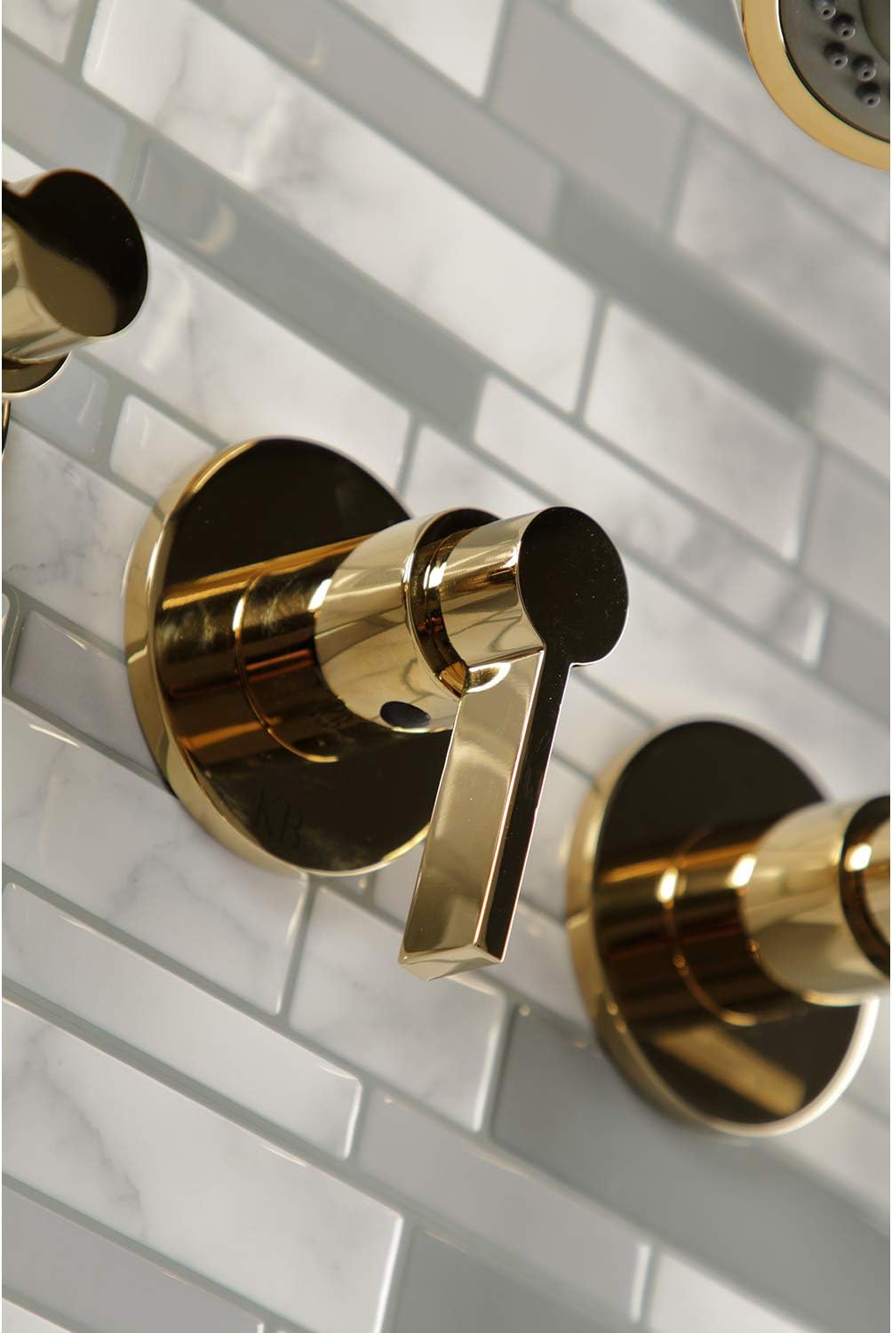Kingston Brass KBX8132NDL NuvoFusion Triple-Handle Tub and Shower Faucet in Polished Brass