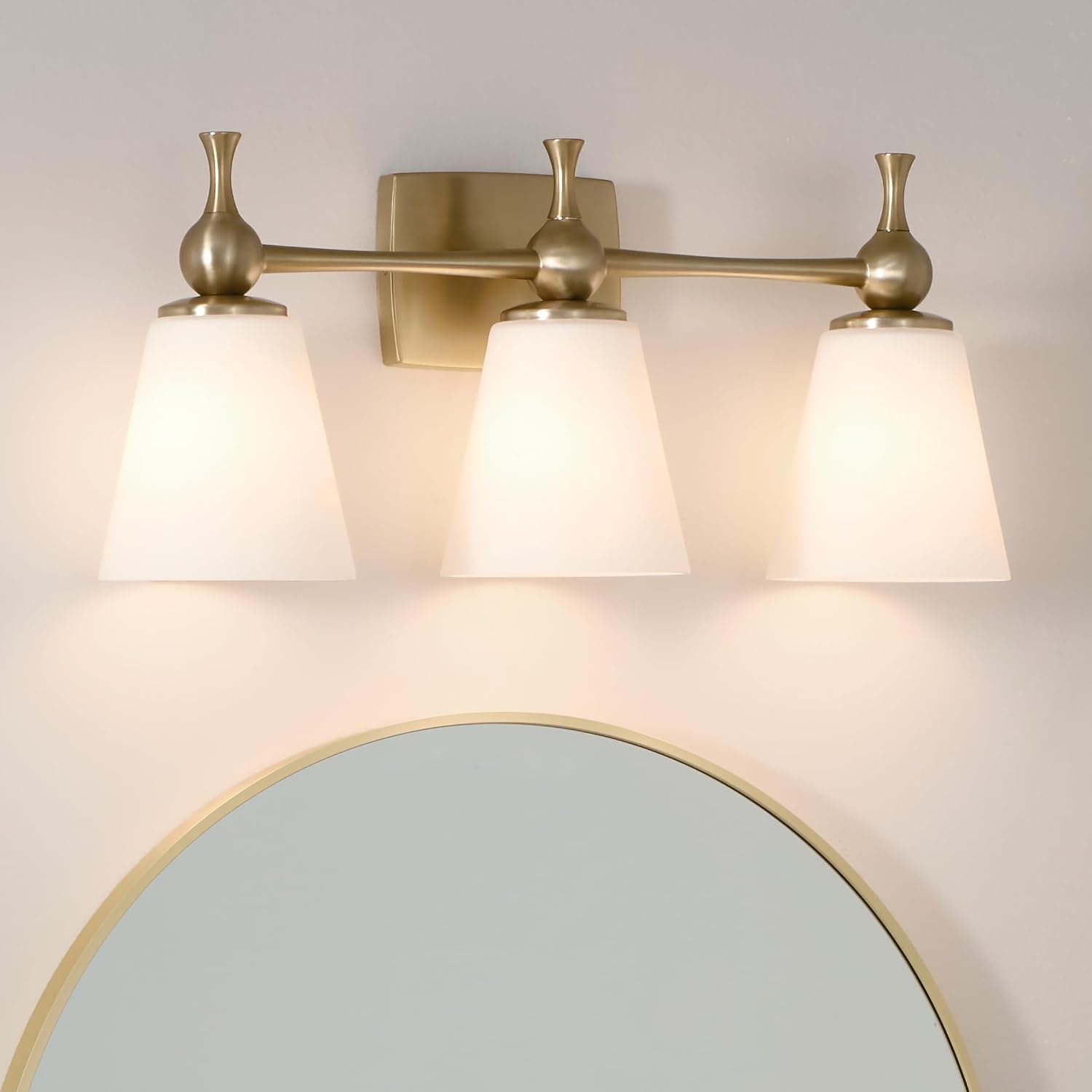 Kichler Cosabella 3-Light 24' Bathroom Vanity Light Fixture with Satin Etched Cased Opal Glass Shades in Champagne Bronze for Modern Bathrooms and Powder Rooms, 55092CPZ
