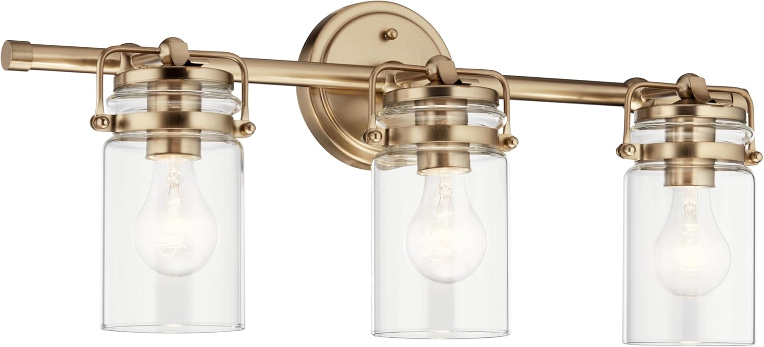 Kichler Brinley 24' 3-Light Bathroom Vanity Light Fixture with Clear Glass in Champagne Bronze, Modern Farmhouse Mason Jar Style for Mirror Lighting (24' W x 10.25' H), 45689CPZ