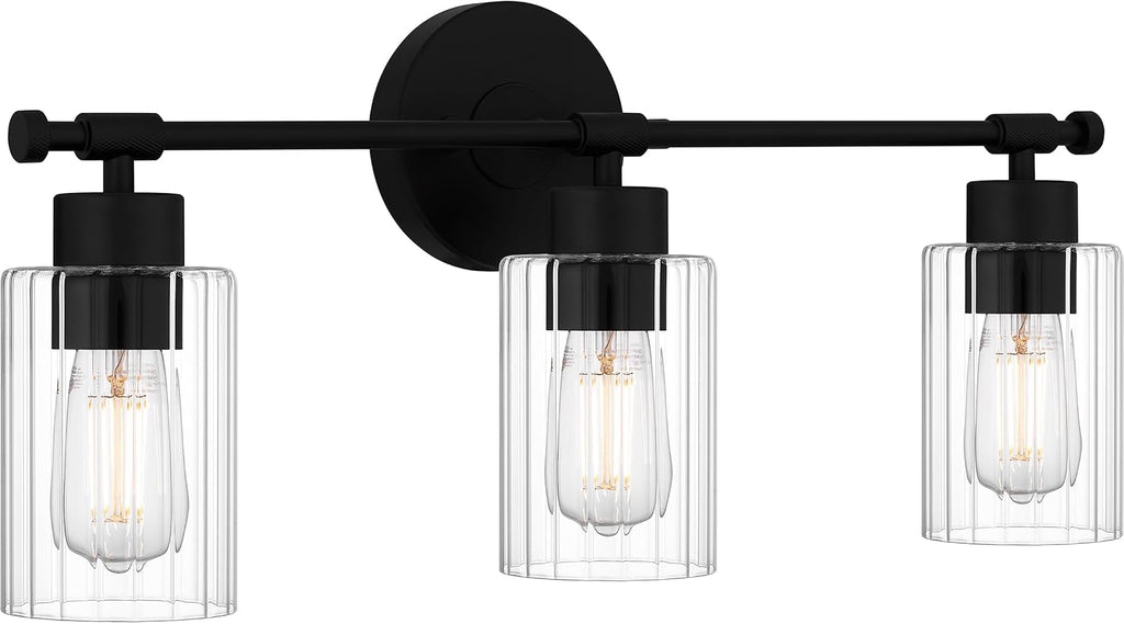 Quoizel Caputo Bath Vanity Lights, 24 Inch 3-Light Matte Black Lighting Fixtures Over Mirror, Clear Ribbed Glass, 100W, Modern Industrial Wall Mount Light for Bathroom, Dresser or Sink