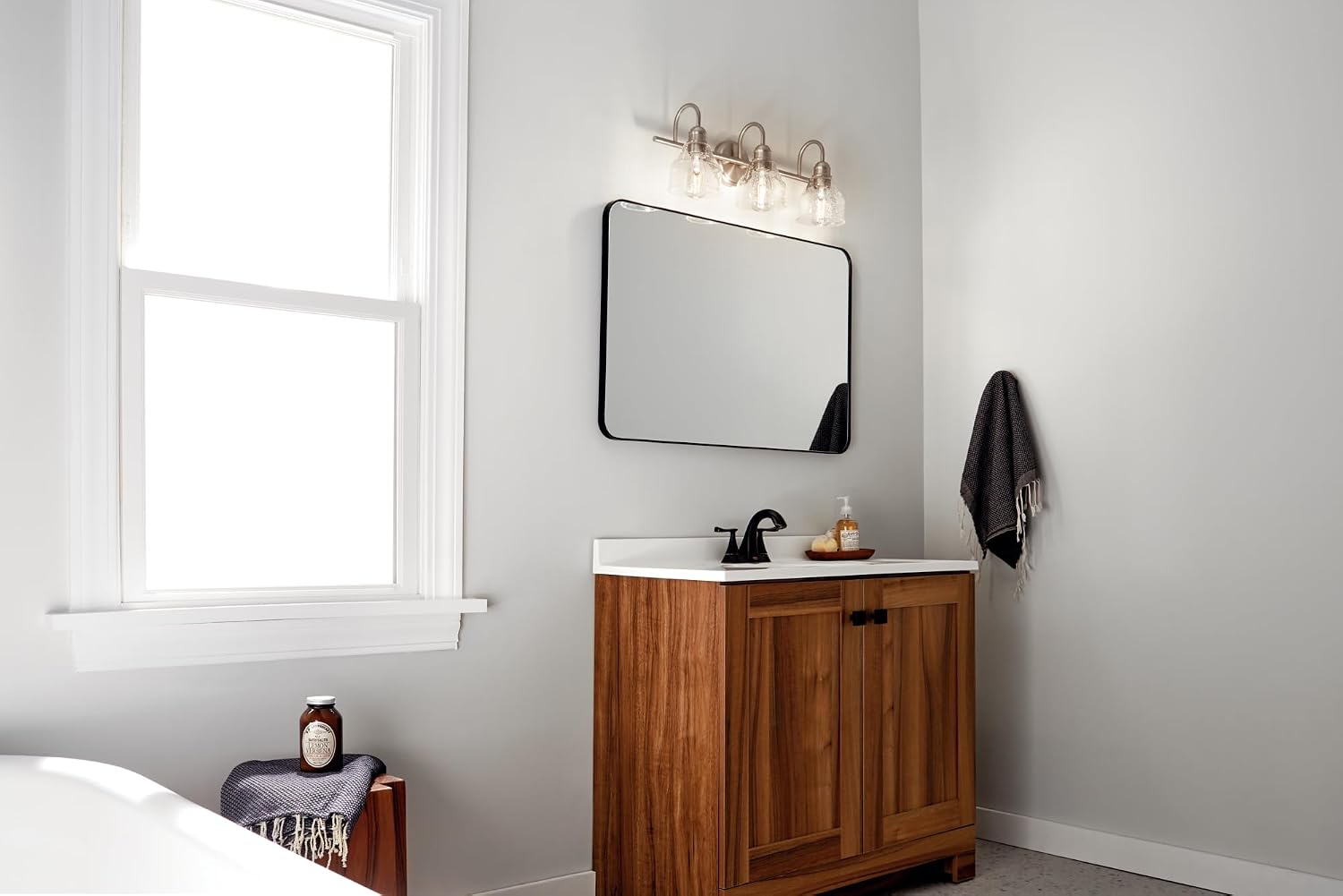 Kichler Avery 24' 3 Light Bathroom Vanity Light in Brushed Nickel, Vintage Bathroom Wall Mount Fixture with Clear Seeded Glass, (24' W x 9.25' H), 45973NI