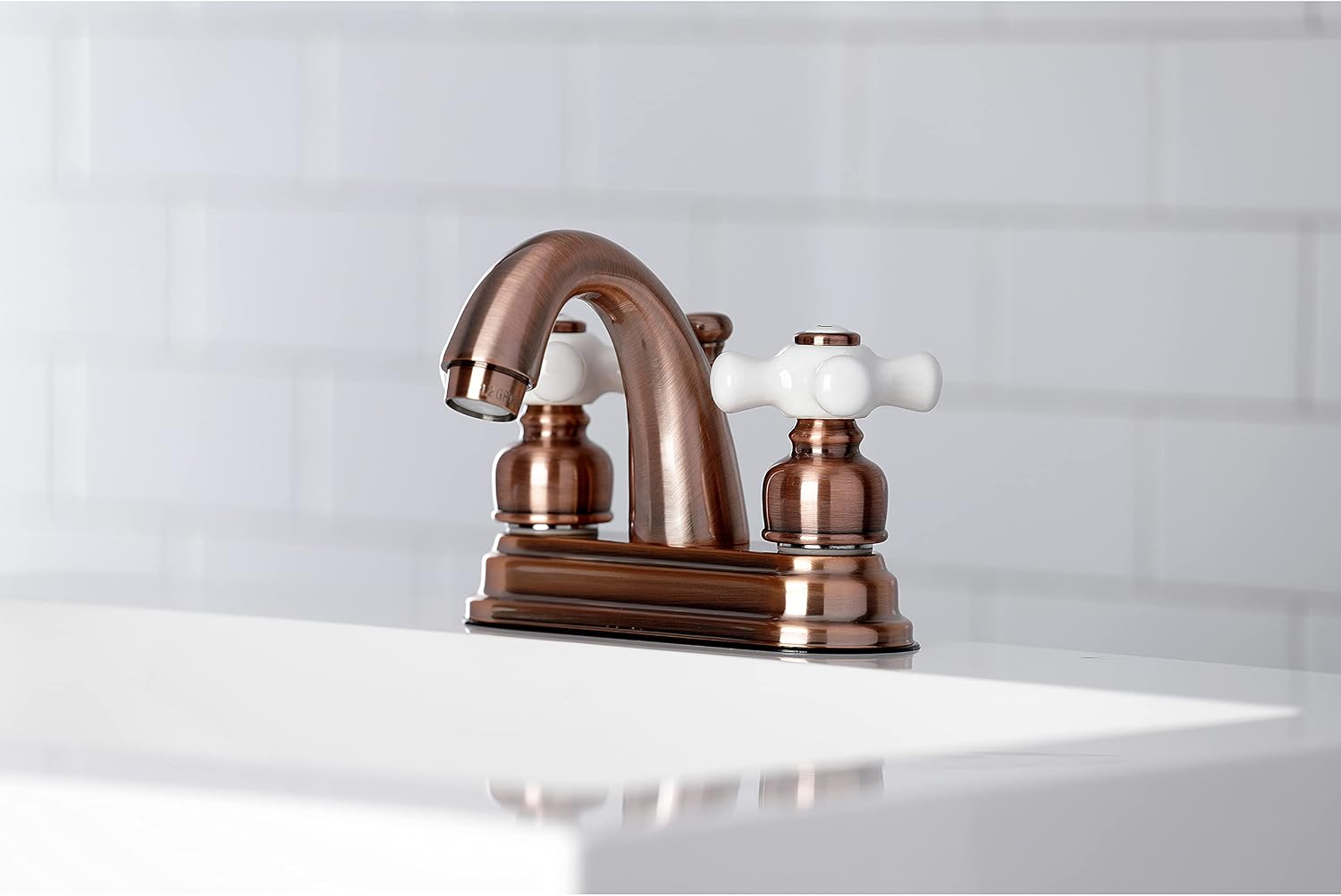 Kingston Brass KB561PXAC Restoration 4 in. Centerset Bathroom Faucet, Antique Copper
