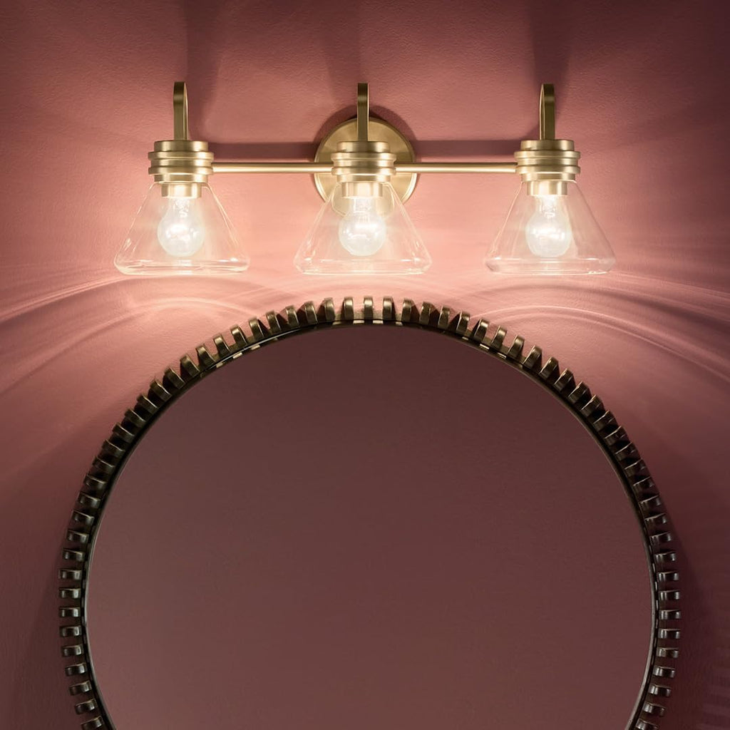Kichler Farum 26' 3-Light Bathroom Vanity Light Fixture with Clear Glass in Champagne Bronze for Over Mirror, Modern Wall Mount Lighting (26' W x 9.5' H), 55155CPZCLR