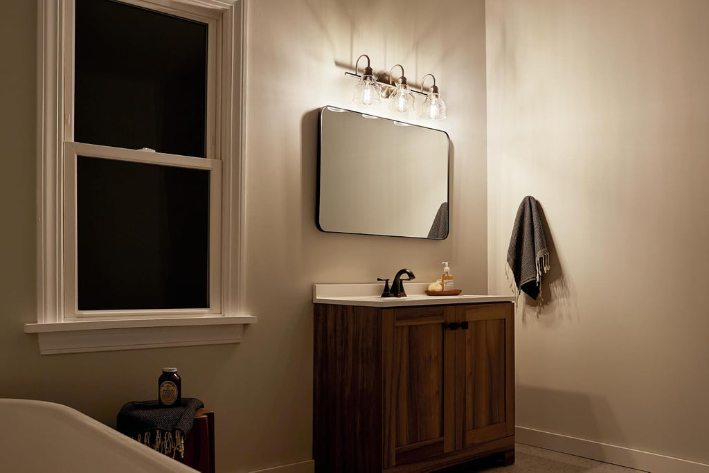 Kichler Avery 24' 3 Light Bathroom Vanity Light in Brushed Nickel, Vintage Bathroom Wall Mount Fixture with Clear Seeded Glass, (24' W x 9.25' H), 45973NI