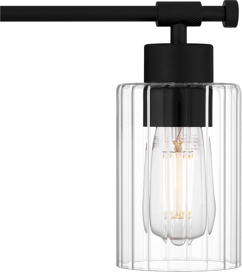 Quoizel Caputo Bath Vanity Lights, 24 Inch 3-Light Matte Black Lighting Fixtures Over Mirror, Clear Ribbed Glass, 100W, Modern Industrial Wall Mount Light for Bathroom, Dresser or Sink