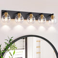 LmnLvn 5-Light Black Gold Vanity Light, Clear Glass | Bathroom light over mirror. Dimmable E26 bulbs (max 60W). Reversible up/down mount. Bedroom/hallway. 2-year warranty.