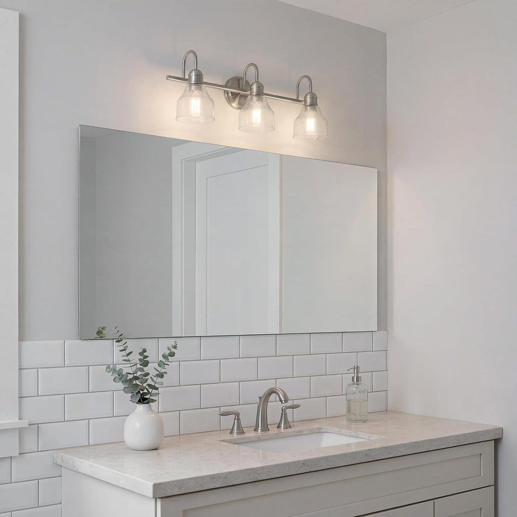 Kichler Avery 24' 3 Light Bathroom Vanity Light in Brushed Nickel, Vintage Bathroom Wall Mount Fixture with Clear Seeded Glass, (24' W x 9.25' H), 45973NI