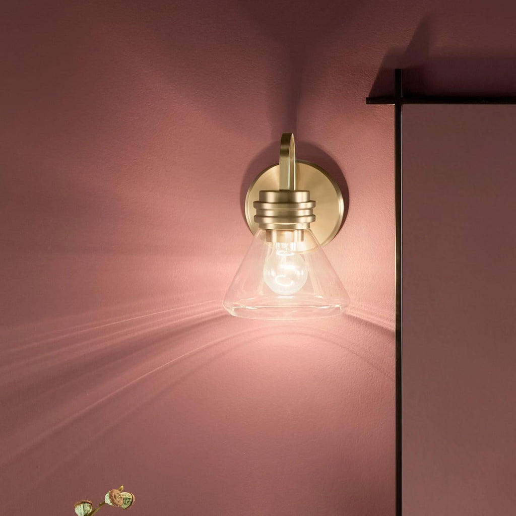 Kichler Farum 7.25' 1-Light Wall Sconce Bathroom Vanity Light Fixture with Clear Glass in Champagne Bronze for Modern Lighting Over Mirror (7.25' W x 9.5' H) 55153CPZCLR