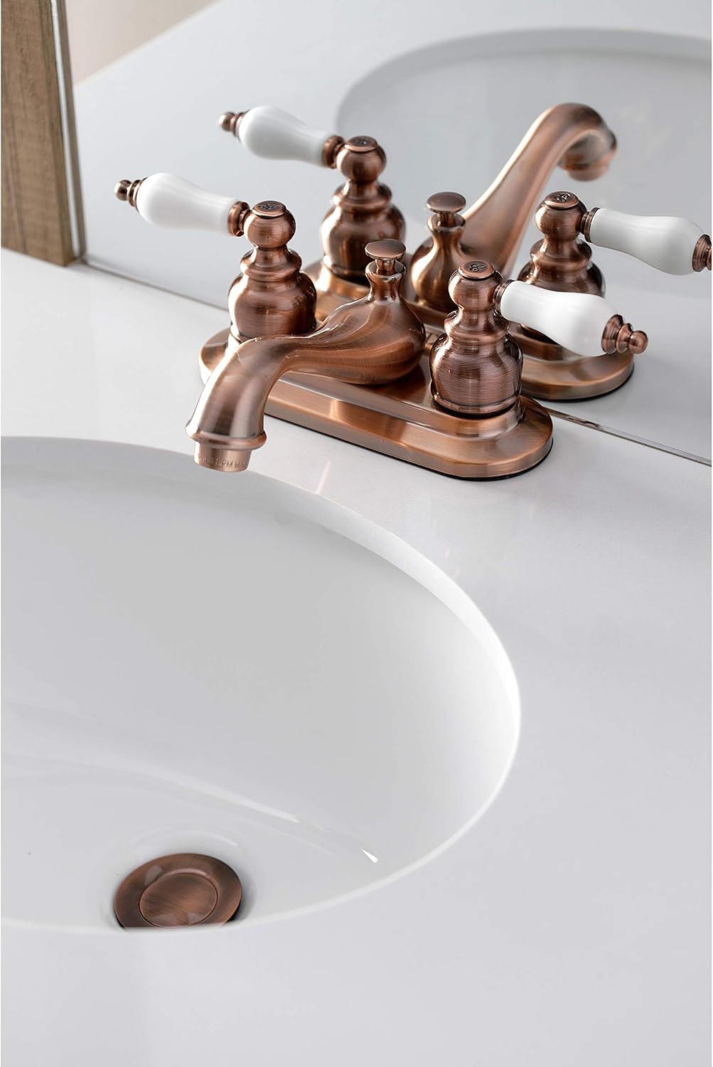 Kingston Brass KB606PL Restoration 4 in. Centerset Bathroom Faucet, Antique Copper