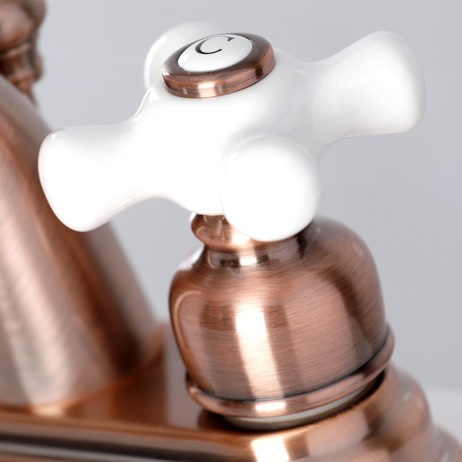 Kingston Brass KB561PXAC Restoration 4 in. Centerset Bathroom Faucet, Antique Copper