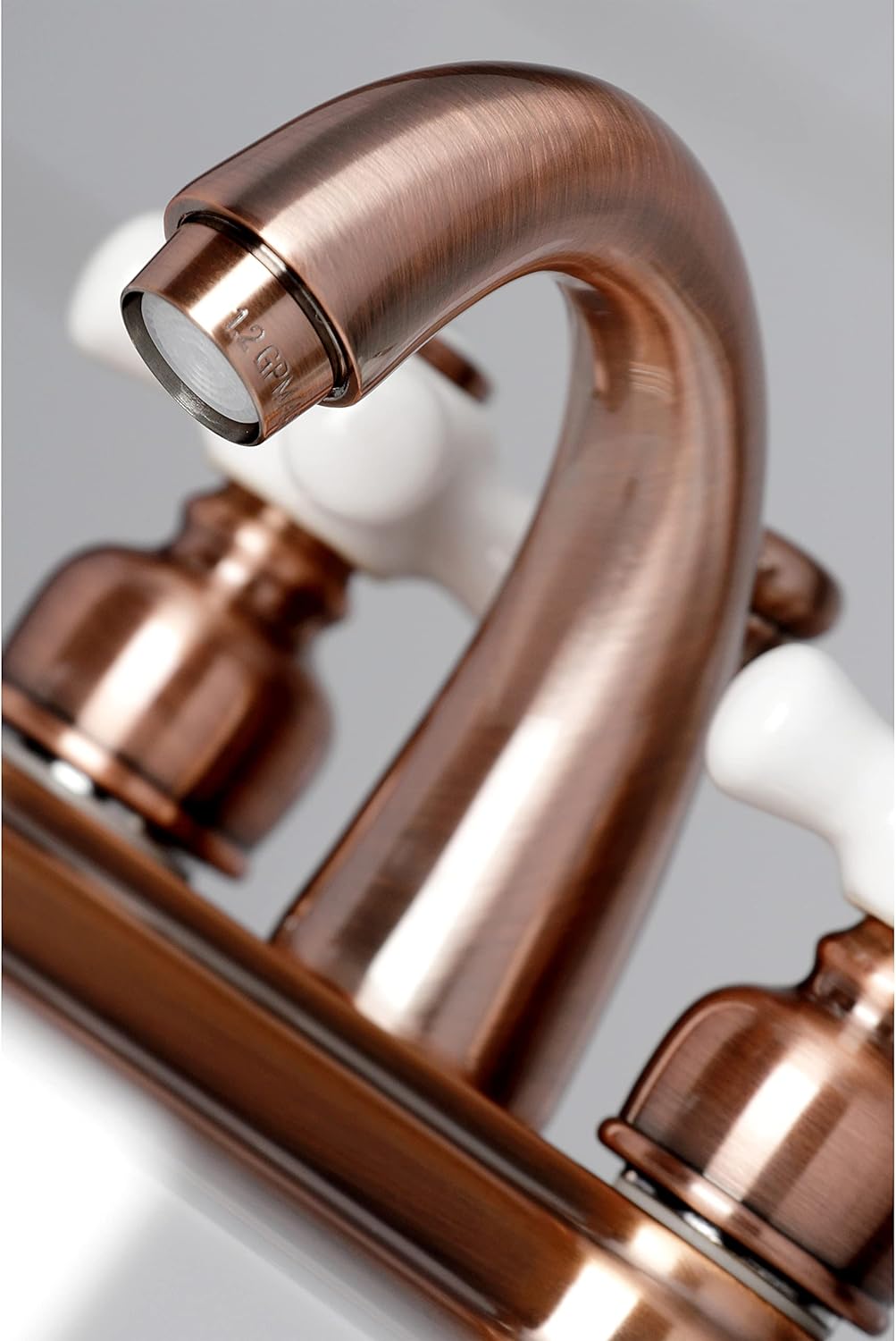 Kingston Brass KB561PXAC Restoration 4 in. Centerset Bathroom Faucet, Antique Copper