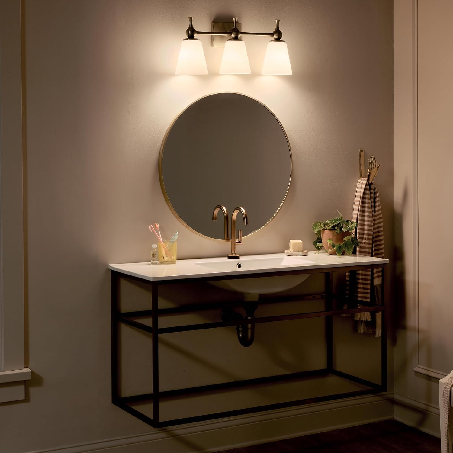Kichler Cosabella 3-Light 24' Bathroom Vanity Light Fixture with Satin Etched Cased Opal Glass Shades in Champagne Bronze for Modern Bathrooms and Powder Rooms, 55092CPZ