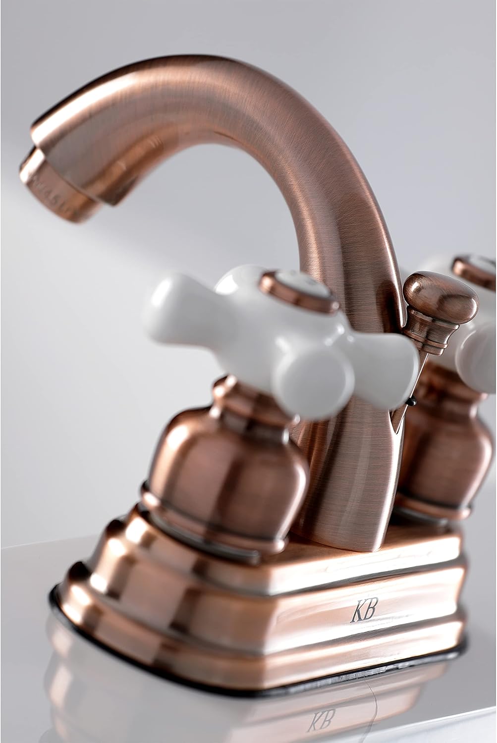 Kingston Brass KB561PXAC Restoration 4 in. Centerset Bathroom Faucet, Antique Copper