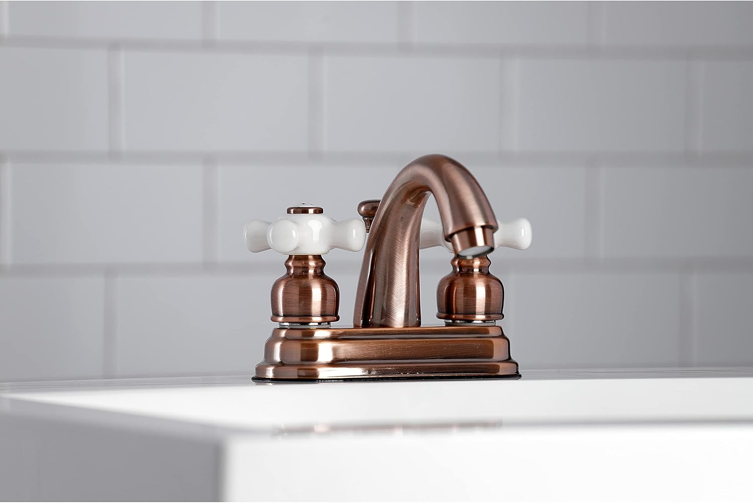 Kingston Brass KB561PXAC Restoration 4 in. Centerset Bathroom Faucet, Antique Copper