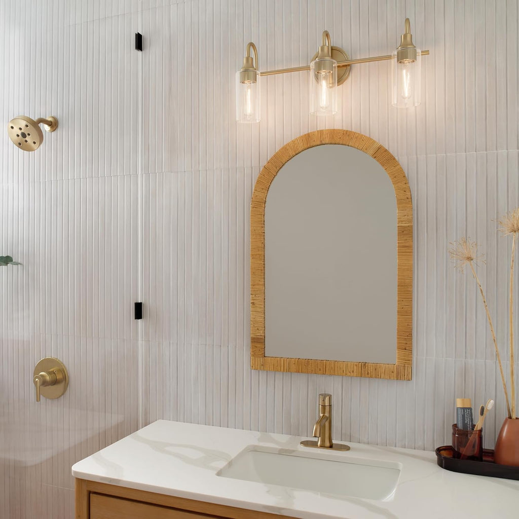 Kichler Kavi 23' 3-Light Bathroom Vanity Light Fixture with Clear Glass in Champagne Bronze, Modern Wall Mount Over Mirror for Powder Room (23' W x 10' H), 55211CPZ