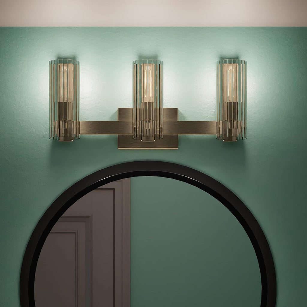 Kichler Jemsa 3-Light Bathroom Vanity Light Fixture with Clear Fluted Glass in Champagne Bronze for Modern Bathroom or Powder Room Wall Lighting (9.75 x 22.75 in), 55168CPZ