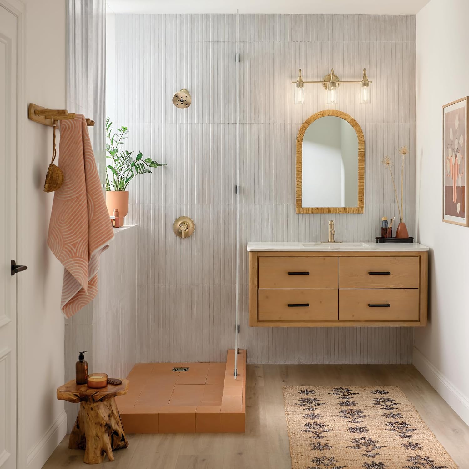 Kichler Kavi 23' 3-Light Bathroom Vanity Light Fixture with Clear Glass in Champagne Bronze, Modern Wall Mount Over Mirror for Powder Room (23' W x 10' H), 55211CPZ