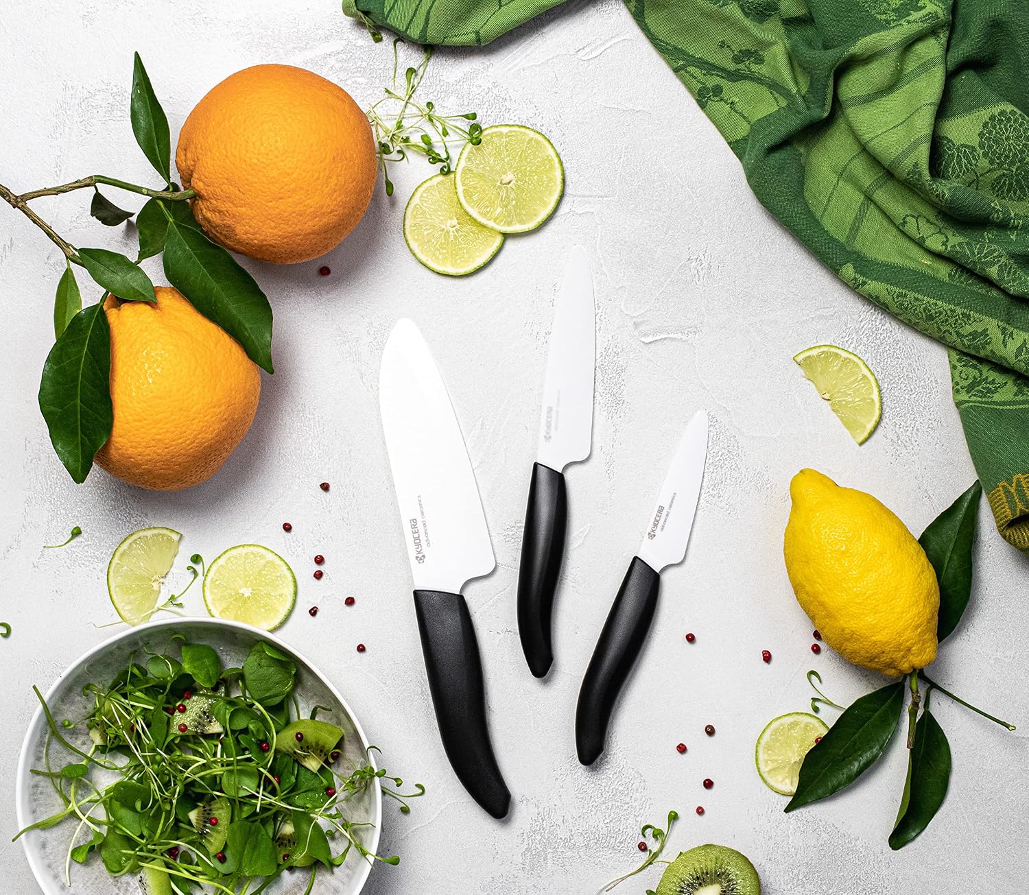 Kyocera Advanced Ceramics – Revolution Series 3-Piece Ceramic Knife Set: Includes 6-inch Chef's Knife; 5-inch Micro Serrated Knife; and 3-inch Paring Knife; Black Handles with White Blades